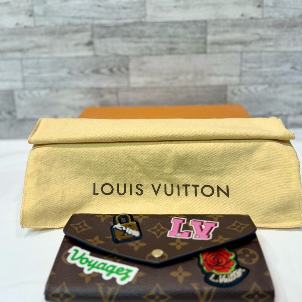 LOUIS VUITTON Monogram Travel Patches Sarah Wallet - Picture 14 of 14